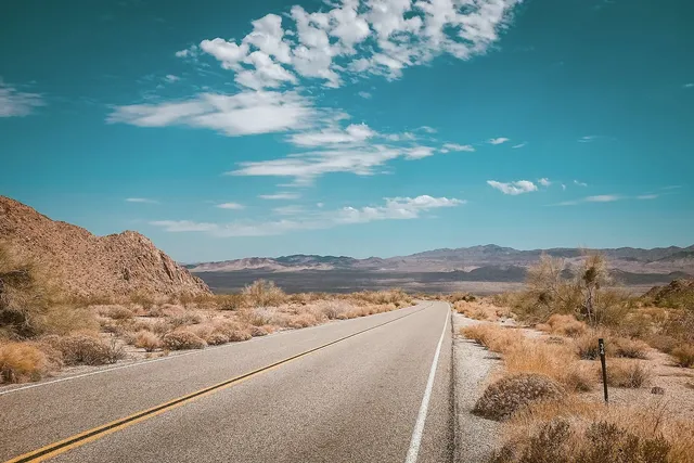 Long empty highway through the desert Southwest