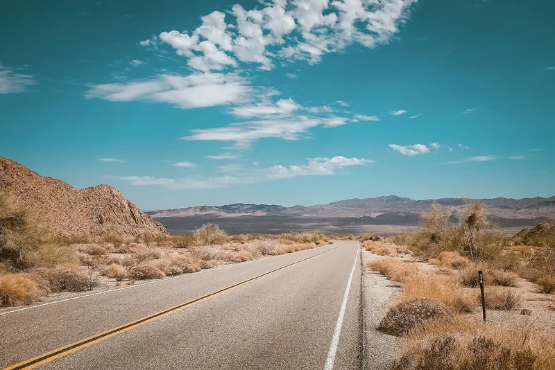 Long empty highway through the desert Southwest
