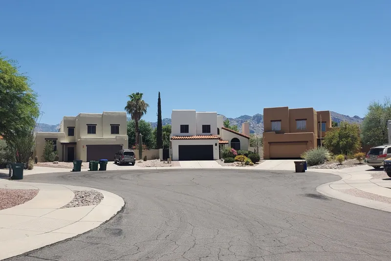 Suburban cul-de-sac with houses and driveways