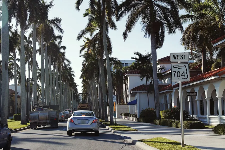 Palm-lined avenue in Palm Beach, Florida